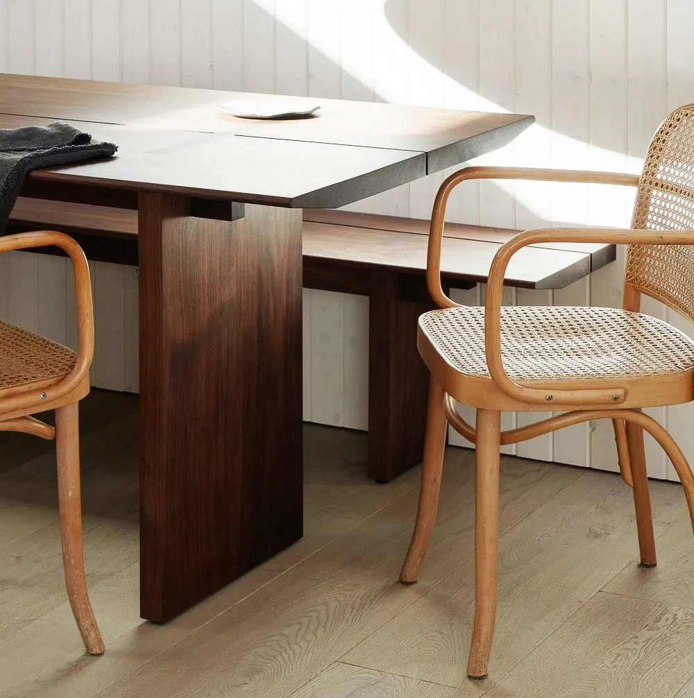 Live-edge wood dining table installed by Oxbow Fabrication