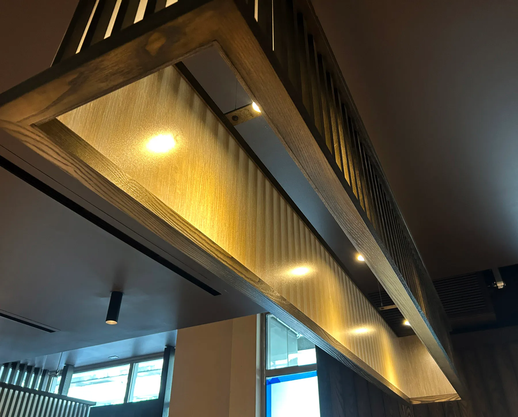 beatifully finished hardwood light fixture by Oxbow